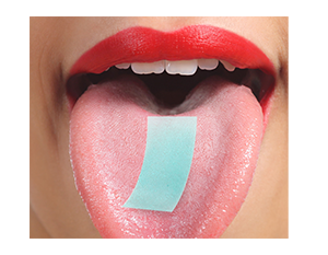 blue nutri-strip placed on tongue